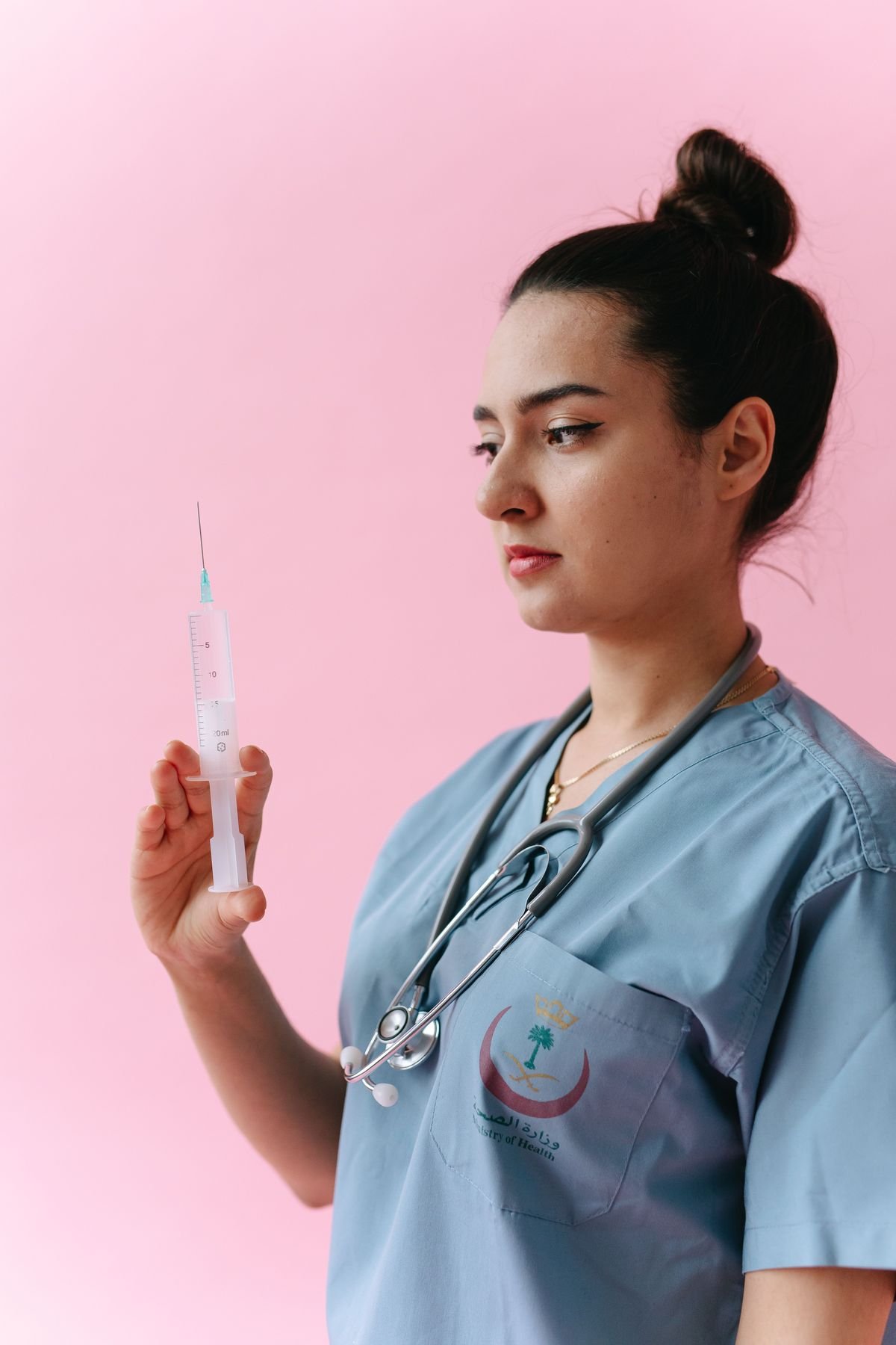 Healthcare provider reviewing credentialing documents with a specialist